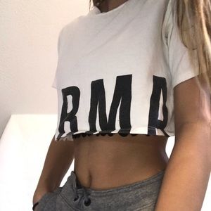 Forever 21 white crop top says “karma”